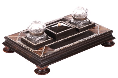 Lot 104 - A Ceylonese ebony desk stand with calamander,...
