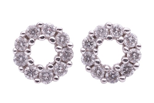 Lot 61 - A pair of diamond set circular stud earrings....
