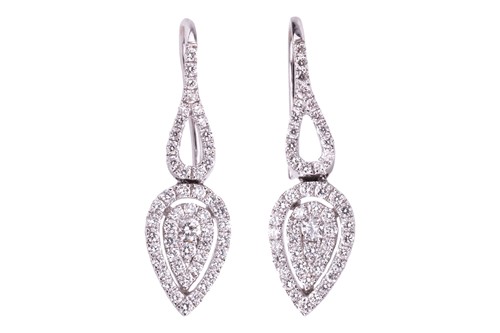 Lot 44 - A pair of diamond set drop earrings. The leaf...