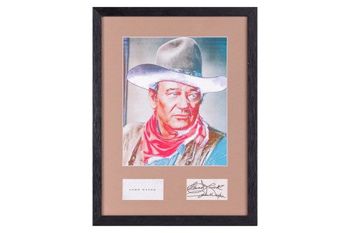 Lot 29 - John Wayne: a framed and glazed photograph...