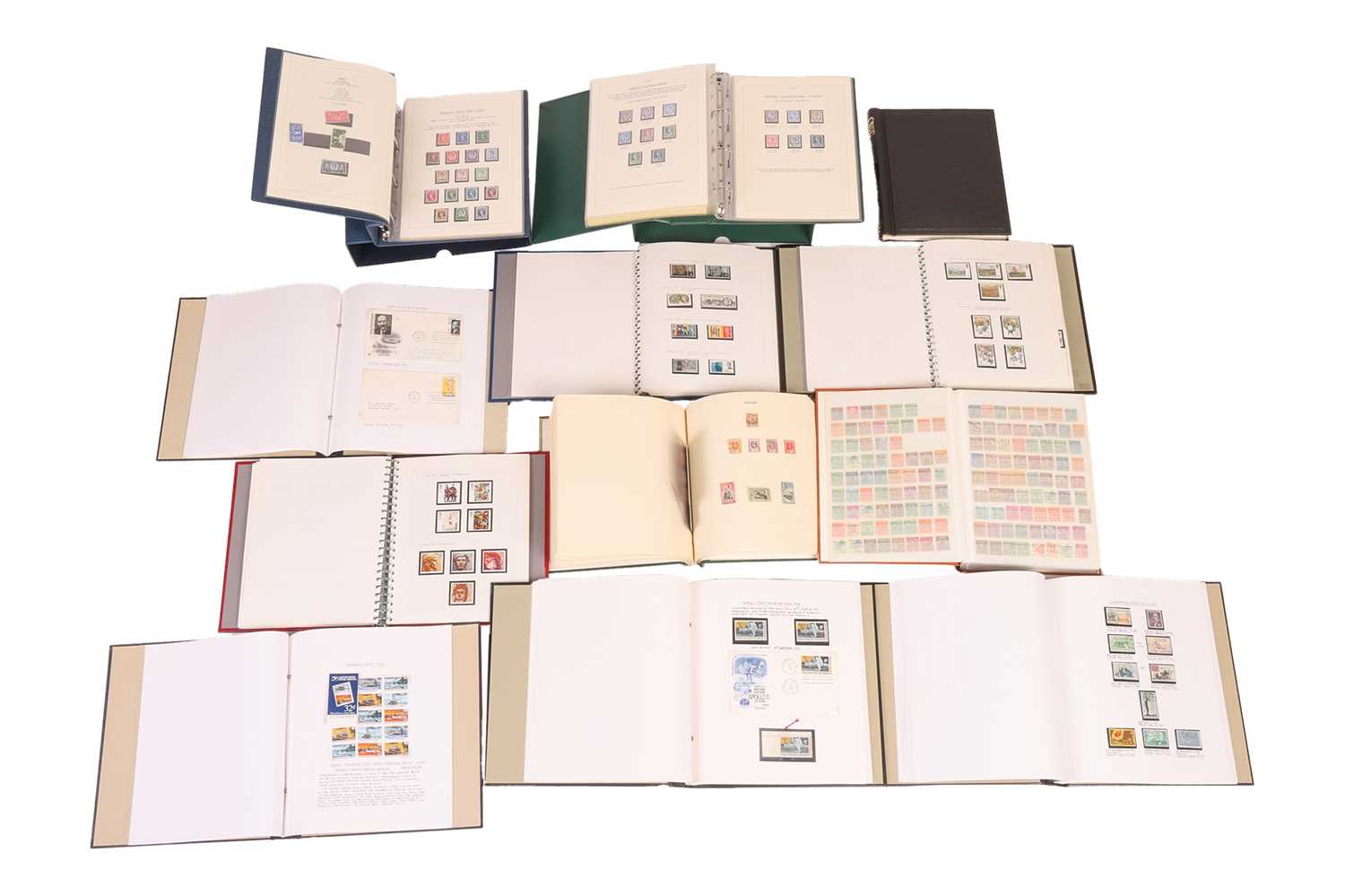 Lot 126 - A large collection of 12 stamp albums...