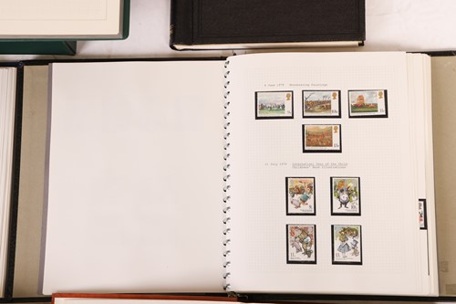 Lot 126 - A large collection of 12 stamp albums...