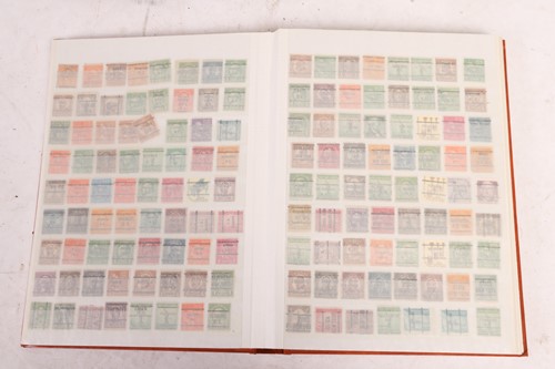 Lot 126 - A large collection of 12 stamp albums...