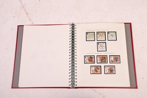 Lot 126 - A large collection of 12 stamp albums...