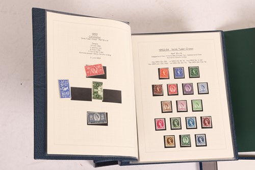 Lot 126 - A large collection of 12 stamp albums...