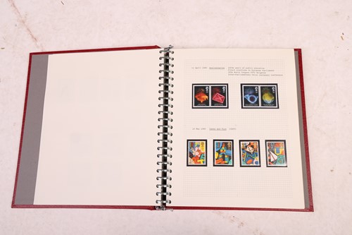 Lot 126 - A large collection of 12 stamp albums...