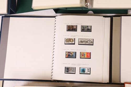 Lot 126 - A large collection of 12 stamp albums...
