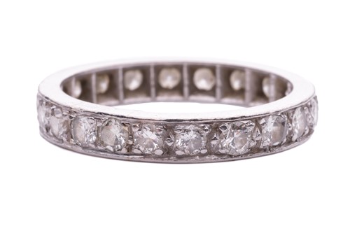 Lot 58 - A diamond eternity ring, pavé-set with a...
