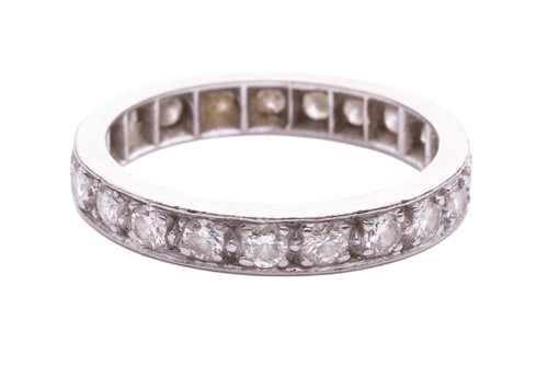 Lot 58 - A diamond eternity ring, pavé-set with a...