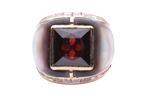 Lot 130 - A gem-set cocktail ring, centred with a square...