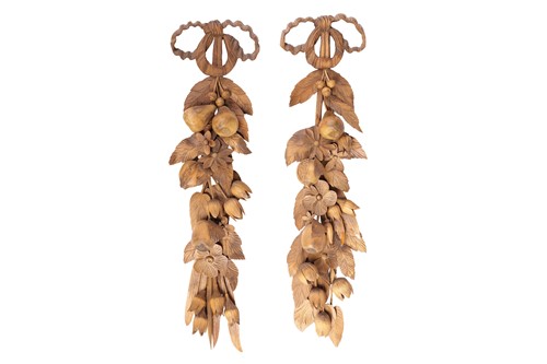 Lot 237 - In the style of Grinling Gibbons, a pair of...