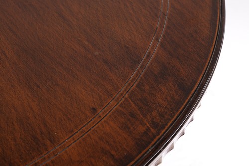 Lot 177 - A contemporary circular dining table with swag...