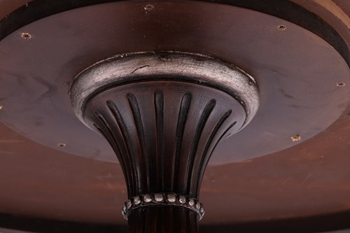 Lot 177 - A contemporary circular dining table with swag...