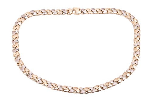 Lot 51 - A fancy curb link necklace in 18ct bi-coloured...