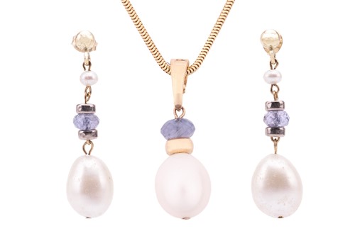 Lot 15 - A cultured pearl and tanzanite pendant on...