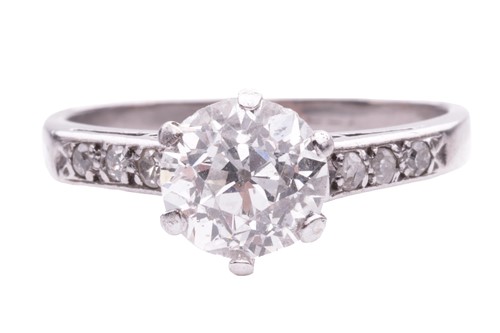 Lot 137 - A diamond solitaire ring, claw-set with an old-...