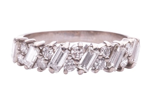 Lot 133 - A half-eternity diamond-set ring, claw set...