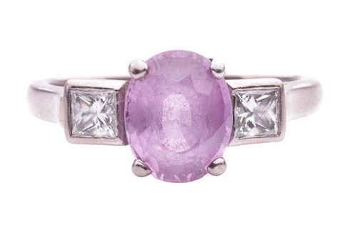 Lot 79 - A pink sapphire and diamond dress ring,...