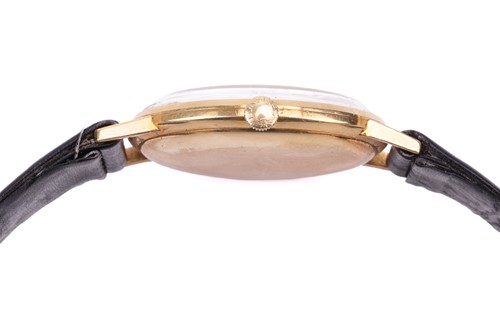 Lot 224 - A Longines gentleman's dress watch in gold....