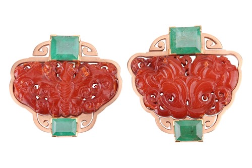 Lot 72 - Two Chinoiserie carved amber and emerald clip...