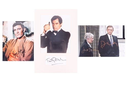 Lot 62 - James Bond: a collection of three signed...