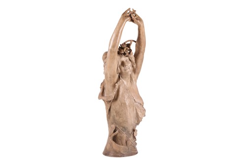 Lot 165 - A large Art Nouveau earthenware figure, in the...