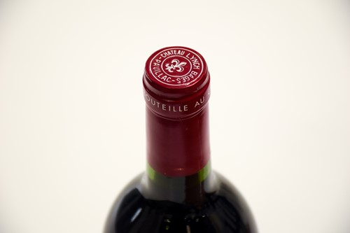 Lot 11 - Four Bottles of Chateau La Dominque St Emilion,...