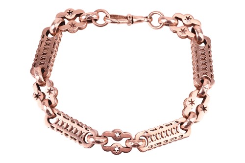 Lot 43 - A fancy link bracelet in 9ct rose gold, hollow...