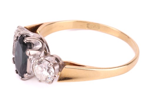 Lot 179 - A sapphire and diamond three-stone ring,...