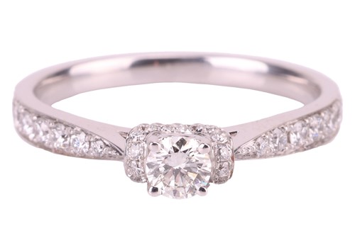 Lot 188 - A diamond solitaire ring, the central round...