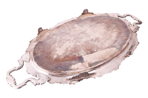 Lot 296 - An Edwardian silver two handled tray, oval...