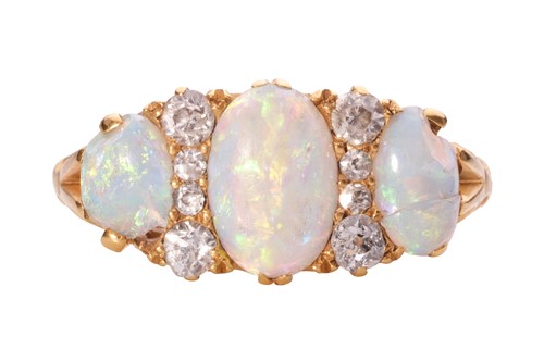 Lot 2 - An Edwardian opal and diamond half-hoop ring,...