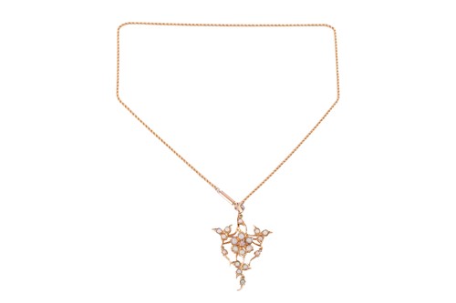 Lot 60 - An opal-set floral brooch cum pendant on chain,...
