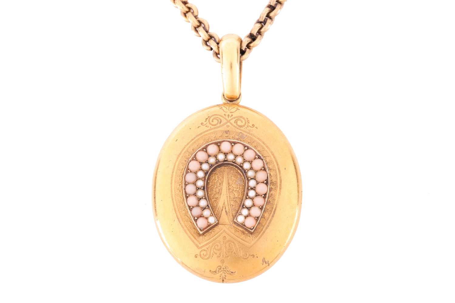 Lot 171 - A Victorian pink coral and seed pearl locket,...