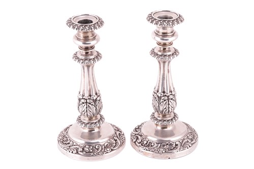 Lot 301 - A pair of George IV silver candlesticks, by S...