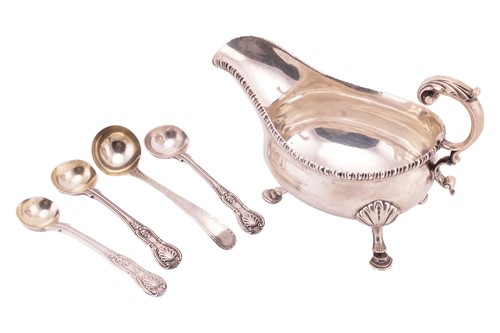 Lot 339 - A George III silver sauce boat, with gadrooned...