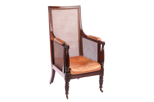 Lot 116 - A William IV mahogany bergere library armchair,...