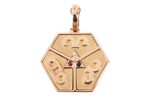 Lot 115 - A gem-set hexagonal zodiac pendant, divided...