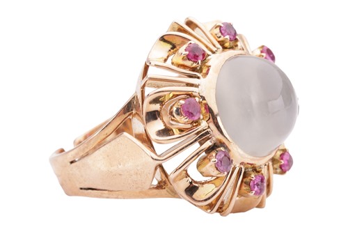 Lot 92 - A moonstone and ruby dress ring, centred with...