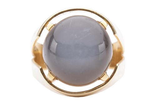 Lot 58 - A grey moonstone cabochon cocktail ring,...