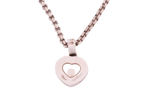 Lot 106 - Chopard - a 'Happy Diamond' heart pendant on...