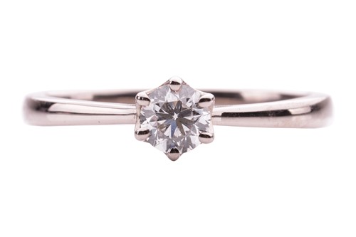 Lot 161 - A diamond solitaire ring in 18ct white gold,...