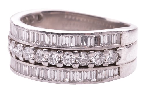 Lot 60 - A three-row diamond dress ring in platinum,...