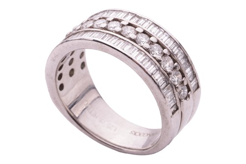 Lot 60 - A three-row diamond dress ring in platinum,...