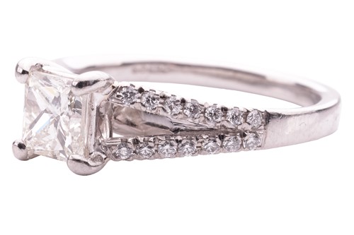 Lot 124 - A princess cut diamond ring, featuring a...