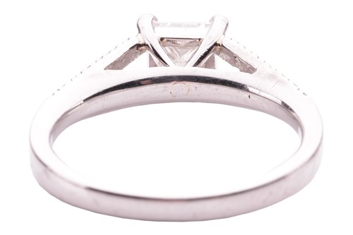 Lot 124 - A princess cut diamond ring, featuring a...