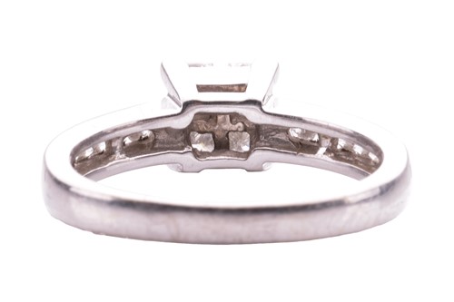Lot 165 - A princess-cut diamond cluster ring, with four...