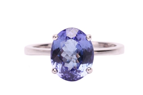 Lot 105 - A tanzanite single stone ring, set with an...