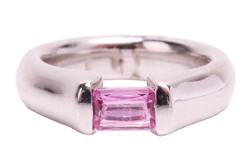 Lot 155 - A pink sapphire dress ring, containing an...