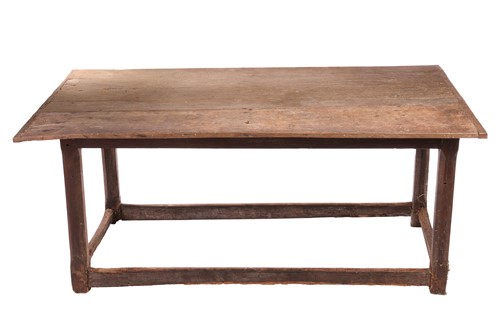 Lot 131 - A rustic oak rectangular tavern table,...